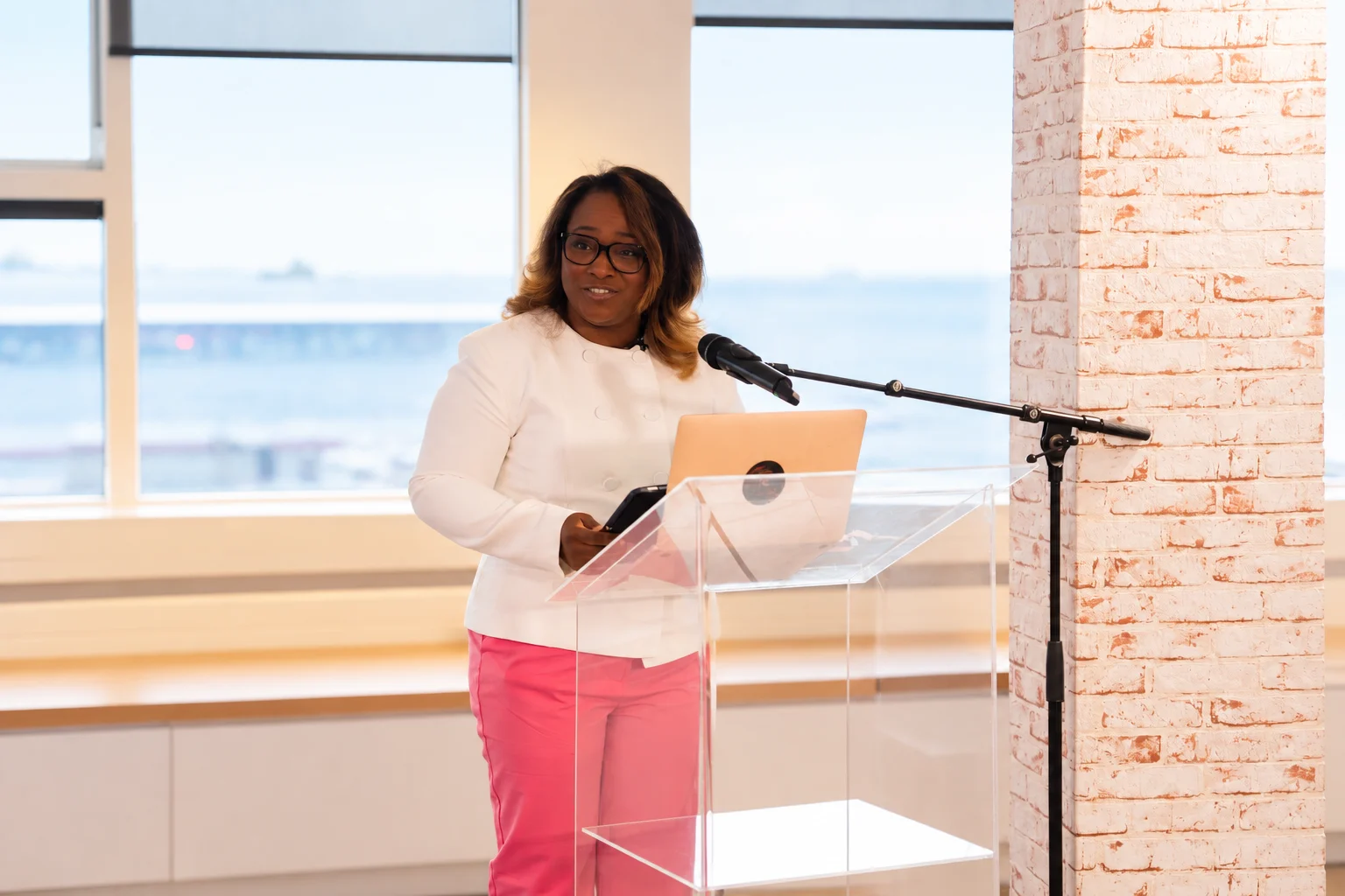 Nathalia speaking at a conference